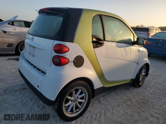 2010 Smart fortwo Pure with VIN WMEEJ3BA6AK358740, listed as a Copart auction lot 76438034 with Not provided miles and Non repairable. Bid and sale history available at DreamBid. Image 3.