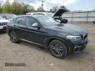 2020 BMW X4 M40i with VIN 5UX2V5C06LLE69603, listed as a Copart auction lot 49705043 with 31,939 mi miles. Bid and sale history available at carsss.com. Image 4.