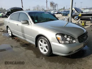 2003 Infiniti Q45 z VIN JNKBF01A03M101890, wystawiony jako Copart lot #86930994 z przebiegiem 158 134 mil mil oraz Szkody całkowita. Historia ofert i sprzedaży dostępna na DreamBid. Obrazek 4.