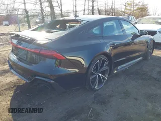 2021 Audi RS 7 z VIN WUAPCBF23MN903930, wystawiony jako IAAI lot #41669778 z przebiegiem 13 175 mil mil oraz . Historia ofert i sprzedaży dostępna na DreamBid. Obrazek 4.