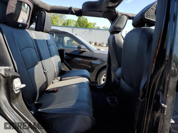 2015 Jeep Wrangler Unlimited Freedom with VIN 1C4BJWDG8FL689194, listed as a Copart auction lot 58016385 with 108,026 mi miles and Salvage title. Bid and sale history available at DreamBid. Image 10.