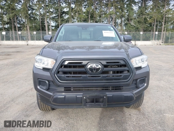 2018 Toyota Tacoma SR z VIN 5TFSX5EN0JX062612, wystawiony jako IAAI lot #41993211 z przebiegiem 92 586 mil mil oraz . Historia ofert i sprzedaży dostępna na DreamBid. Obrazek 12.