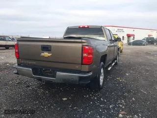 2015 Chevrolet Silverado 1500 LT with VIN 3GCUKRECXFG169272, listed as a IAAI auction lot 41449120 with 184,170 mi miles. Bid and sale history available at carsss.com. Image 4.