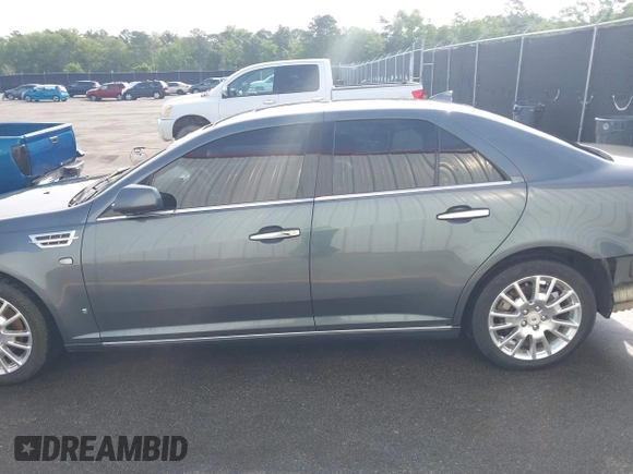 2009 Cadillac STS AWD w/1SB with VIN 1G6DD67V090151883, listed as a IAAI auction lot 42075438 with 97,408 mi miles. Bid and sale history available at carsss.com. Image 15.