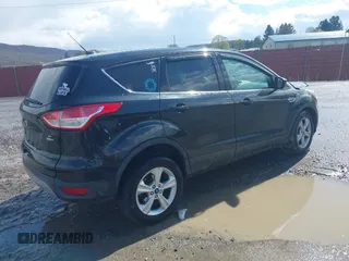 2014 Ford Escape SE with VIN 1FMCU9GX2EUD41176, listed as a IAAI auction lot 42028822 with 101,595 mi miles and . Bid and sale history available at DreamBid. Image 4.