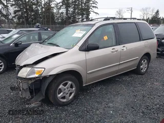 2001 Mazda MPV DX with VIN JM3LW28Y810184260, listed as a IAAI auction lot 41148164 with 237,533 mi miles. Bid and sale history available at carsss.com. Image 2.