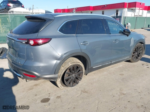2021 Mazda CX-9 Grand Touring with VIN JM3TCBDY2M0530533, listed as a IAAI auction lot 41309425 with 84,747 mi miles. Bid and sale history available at carsss.com. Image 4.