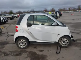 2013 Smart fortwo Pure with VIN WMEEJ3BA2DK702004, listed as a IAAI auction lot 41829808 with 53,545 mi miles and . Bid and sale history available at DreamBid. Image 14.