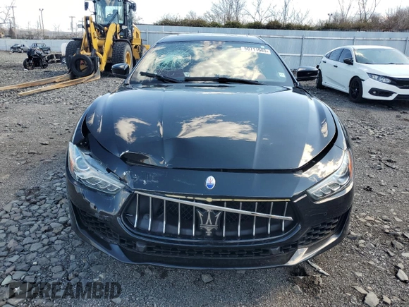 2019 Maserati Ghibli S Q4 z VIN ZAM57YTA8K1328392, wystawiony jako Copart lot #50711685 z przebiegiem 56 609 mil mil oraz Szkoda całkowita • Salvage title. Historia ofert i sprzedaży dostępna na DreamBid. Obrazek 5.