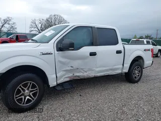 2016 Ford F-150 XLT with VIN 1FTEW1E84GKE18228, listed as a IAAI auction lot 41883297 with 147,018 mi miles. Bid and sale history available at carsss.com. Image 6.