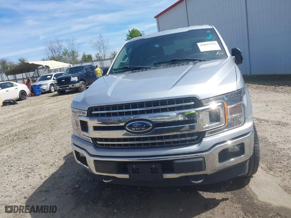 2018 Ford F-150 XL with VIN 1FTEW1EG2JFE36699, listed as a IAAI auction lot 41842524 with 152,813 mi miles. Bid and sale history available at carsss.com. Image 12.
