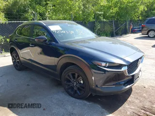 2024 Mazda CX-30 S Select Sport with VIN 3MVDMBBM7RM698178, listed as a IAAI auction lot 42561338 with 25,112 mi miles and . Bid and sale history available at DreamBid. Image 1.