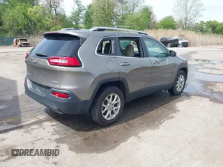 2016 Jeep Cherokee Latitude with VIN 1C4PJMCS6GW242153, listed as a IAAI auction lot 42107782 with 90,562 mi miles and . Bid and sale history available at carsss.com. Image 4.