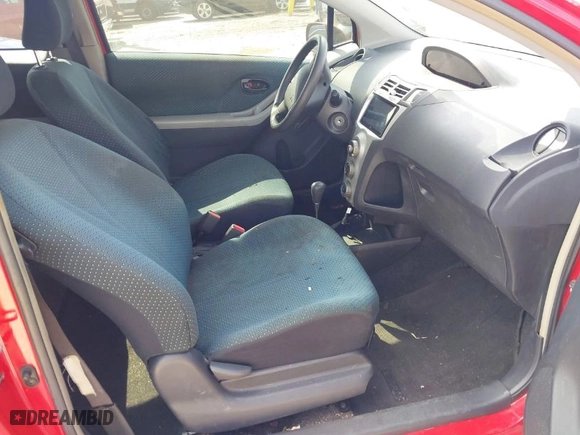 2007 Toyota Yaris with VIN JTDJT923375055871, listed as a IAAI auction lot 42038371 with 115,209 mi miles. Bid and sale history available at carsss.com. Image 5.