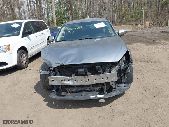 2016 Mazda Mazda3 i Sport with VIN JM1BM1T71G1335980, listed as a IAAI auction lot 42003186 with 131,015 mi miles. Bid and sale history available at carsss.com. Image 6.