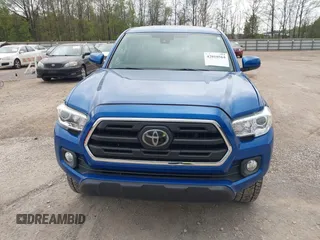 2018 Toyota Tacoma SR5 with VIN 3TMAZ5CNXJM069212, listed as a IAAI auction lot 42010564 with 73,825 mi miles and . Bid and sale history available at DreamBid. Image 12.