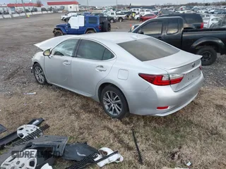 2016 Lexus ES 300h z VIN JTHBW1GGXG2109451, wystawiony jako IAAI lot #41168128 z przebiegiem 101 603 mil mil oraz . Historia ofert i sprzedaży dostępna na DreamBid. Obrazek 3.