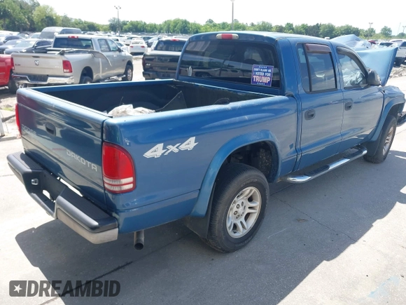 2004 Dodge Dakota Sport z VIN 1D7HG38N84S709758, wystawiony jako IAAI lot #42168491 z przebiegiem 238 479 mil mil oraz . Historia ofert i sprzedaży dostępna na DreamBid. Obrazek 4.