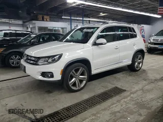 2014 Volkswagen Tiguan S with VIN WVGBV3AX7EW047808, listed as a Copart auction lot 63049195 with 106,163 mi miles and Clean title. Bid and sale history available at DreamBid. Image 1.