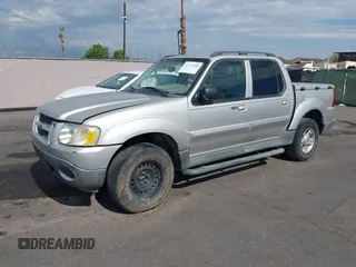 2004 Ford Explorer Sport Trac XLS z VIN 1FMZU77K64UB93602, wystawiony jako IAAI lot #42737380 z przebiegiem 224 488 mil mil oraz . Historia ofert i sprzedaży dostępna na DreamBid. Obrazek 2.