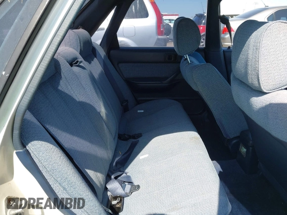 1990 Toyota Camry z VIN JT2SV21E9L0352085, wystawiony jako IAAI lot #42419588 z przebiegiem 138 425 mil mil oraz . Historia ofert i sprzedaży dostępna na DreamBid. Obrazek 8.