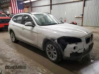 2014 BMW X1 xDrive28i with VIN WBAVL1C57EVY14339, listed as a Copart auction lot 42933495 with 121,026 mi miles and Salvage Title. Bid and sale history available at carsss.com. Image 4.