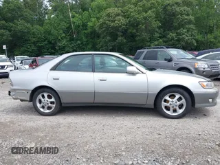 2001 Lexus ES 300 z VIN JT8BF28G910291019, wystawiony jako IAAI lot #42488530 z przebiegiem 170 168 mil mil oraz . Historia ofert i sprzedaży dostępna na DreamBid. Obrazek 13.