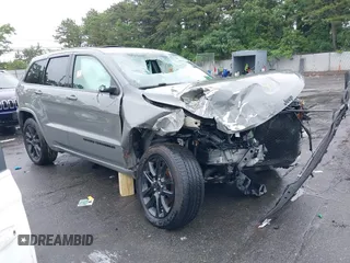 2021 Jeep Grand Cherokee Laredo X with VIN 1C4RJFAG2MC589415, listed as a IAAI auction lot 42514387 with 66,033 mi miles and . Bid and sale history available at DreamBid. Image 1.