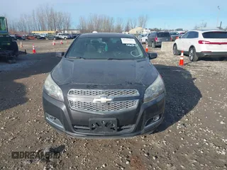 2013 Chevrolet Malibu LTZ with VIN 1G11H5SA9DF150247, listed as a IAAI auction lot 41376113 with 190,498 mi miles and . Bid and sale history available at DreamBid. Image 6.