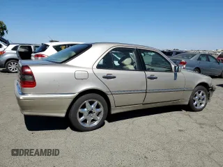 1998 Mercedes-Benz C 230/260/280/320 with VIN WDBHA23G4WA564563, listed as a Copart auction lot 71414284 with 277,741 mi miles and Salvage Title. Bid and sale history available at carsss.com. Image 3.