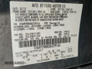 2013 Ford Taurus SEL with VIN 1FAHP2H8XDG229163, listed as a Copart auction lot 71637534 with 120,525 mi miles and Clean Title. Bid and sale history available at DreamBid. Image 12.