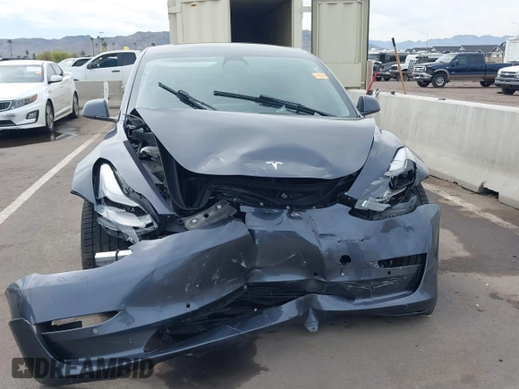 2022 Tesla Model 3 Performance with VIN 5YJ3E1EC3NF296891, listed as a IAAI auction lot 41808329 with 82,682 mi miles and . Bid and sale history available at DreamBid. Image 6.