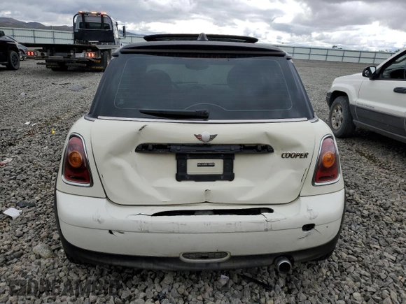 2007 MINI Hardtop with VIN WMWMF33567TT56922, listed as a Copart auction lot 56598665 with 66,605 mi miles and Salvage title. Bid and sale history available at DreamBid. Image 6.