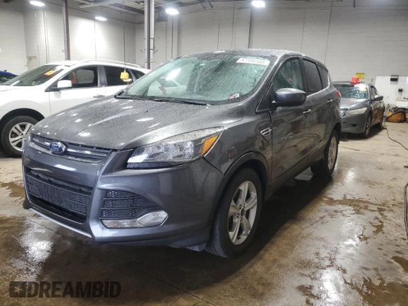 2015 Ford Escape SE with VIN 1FMCU9GX3FUB23667, listed as a Copart auction lot 52184155 with 184,954 mi miles and Salvage Title. Bid and sale history available at carsss.com. Image 1.