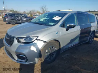 2023 Chrysler Pacifica Hybrid Limited with VIN 2C4RC1S72PR588627, listed as a IAAI auction lot 42063631 with 52,799 mi miles. Bid and sale history available at carsss.com. Image 20.