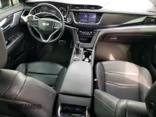 2020 Cadillac XT6 AWD Sport z VIN 1GYKPGRS3LZ109709, wystawiony jako Copart lot #75341924 z przebiegiem 60 420 mil mil oraz Szkoda całkowita • Salvage title. Historia ofert i sprzedaży dostępna na DreamBid. Obrazek 8.