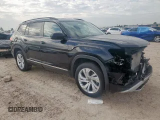 2021 Volkswagen Atlas SE with VIN 1V2WR2CA3MC519899, listed as a Copart auction lot 64051135 with 60,586 mi miles and Salvage title. Bid and sale history available at DreamBid. Image 4.