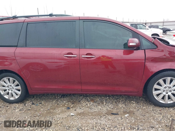 2014 Toyota Sienna XLE z VIN 5TDYK3DC9ES425398, wystawiony jako IAAI lot #41551678 z przebiegiem 224 667 mil mil oraz . Historia ofert i sprzedaży dostępna na DreamBid. Obrazek 14.