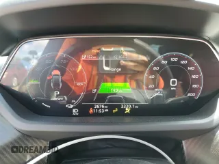 2022 Audi RS e-tron GT z VIN WAUBHBFWXN7904541, wystawiony jako Copart lot #68877093 z przebiegiem 2676 mil mil oraz . Historia ofert i sprzedaży dostępna na DreamBid. Obrazek 9.