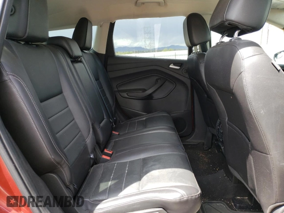 2016 Ford Escape SE z VIN 1FMCU9G9XGUC27074, wystawiony jako Copart lot #55788625 z przebiegiem 106 990 mil mil oraz Szkoda całkowita • Salvage title. Historia ofert i sprzedaży dostępna na DreamBid. Obrazek 11.