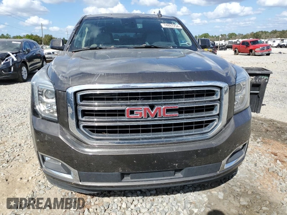 2020 GMC Yukon SLT with VIN 1GKS1BKC3LR238700, listed as a Copart auction lot 74897254 with 82,806 mi miles and Salvage Title. Bid and sale history available at DreamBid. Image 5.