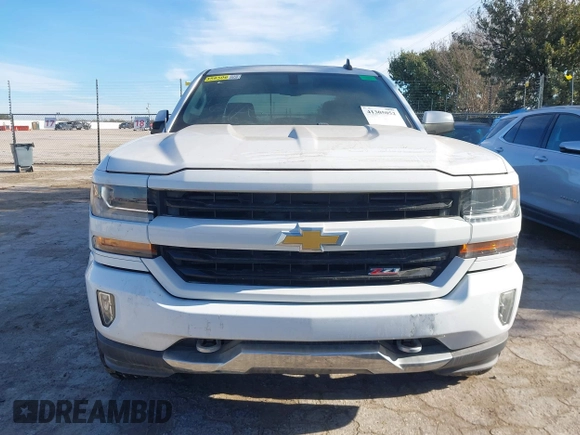 2017 Chevrolet Silverado 1500 LT with VIN 3GCUKREC4HG466329, listed as a IAAI auction lot 41305052 with 57,844 mi miles and . Bid and sale history available at DreamBid. Image 11.