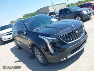 2019 Cadillac XT4 FWD Premium Luxury with VIN 1GYFZCR48KF141478, listed as a IAAI auction lot 41988092 with 53,970 mi miles. Bid and sale history available at carsss.com. Image 1.