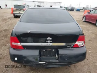 2000 Nissan Altima XE with VIN 1N4DL01D9YC104061, listed as a IAAI auction lot 41970227 with 176,515 mi miles and . Bid and sale history available at carsss.com. Image 16.