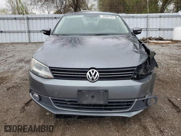 2014 Volkswagen Jetta Comfortline with VIN 3VWDL7AJ2EM399732, listed as a Copart auction lot 55946795 with 198,723 mi miles and Clean title. Bid and sale history available at DreamBid. Image 5.