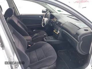 2003 Volkswagen Passat GL z VIN WVWMD63B23P440805, wystawiony jako IAAI lot #41545000 z przebiegiem 167 982 mil mil oraz . Historia ofert i sprzedaży dostępna na DreamBid. Obrazek 5.