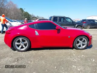 2009 Nissan 370Z Touring with VIN JN1AZ44E69M405179, listed as a IAAI auction lot 41762303 with 132,853 mi miles and . Bid and sale history available at DreamBid. Image 14.