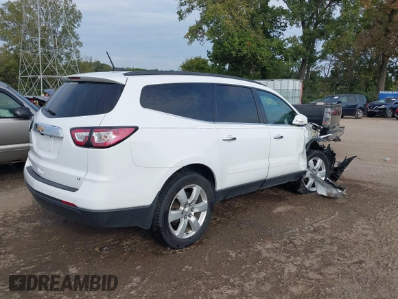 2017 Chevrolet Traverse LT with VIN 1GNKRGKD4HJ338716, listed as a IAAI auction lot 40265414 with 131,097 mi miles and . Bid and sale history available at DreamBid. Image 4.