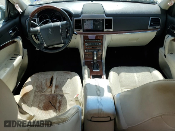 2012 Lincoln MKZ with VIN 3LNHL2GC9CR813164, listed as a Copart auction lot 56974105 with 103,830 mi miles and Salvage title. Bid and sale history available at DreamBid. Image 8.