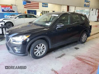 2016 Mazda CX-5 Sport with VIN JM3KE4BY1G0870166, listed as a Copart auction lot 60433035 with 93,433 mi miles and Salvage title. Bid and sale history available at DreamBid. Image 1.
